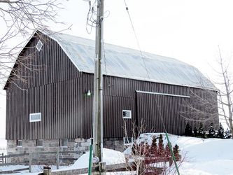 Wiseline Diamond Rib Metal Siding Installed by Upright Construction Inc. based in Elgin County Ontario.