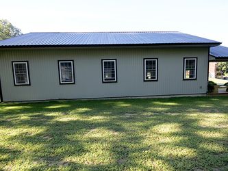 Wiseline Tuff Rib Metal Roof and Diamond Rib Metal Siding Installed by Upright Construction Inc. based in Elgin County Ontario.