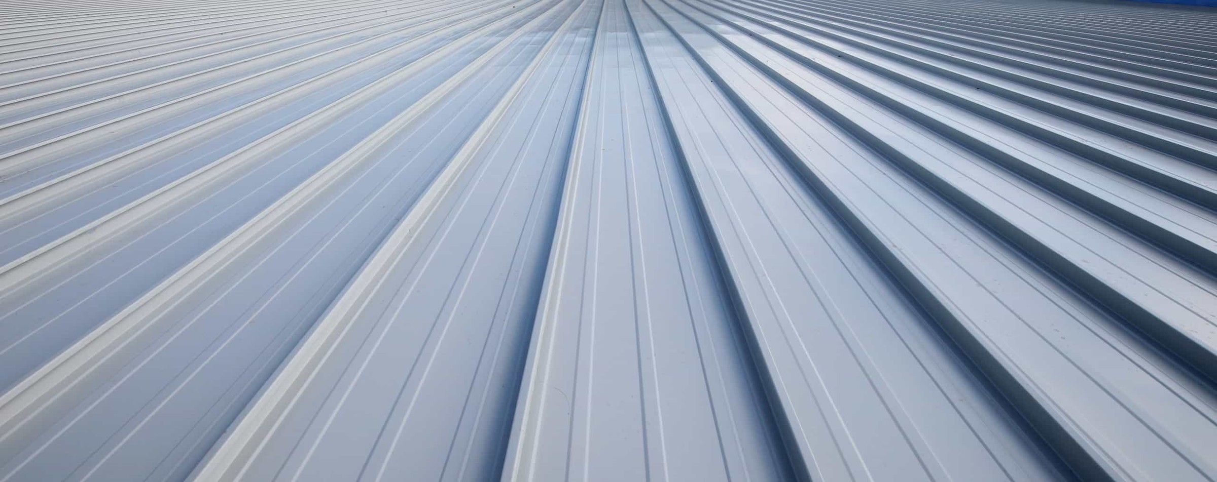 Close-up of grey standing seam metal roof panels